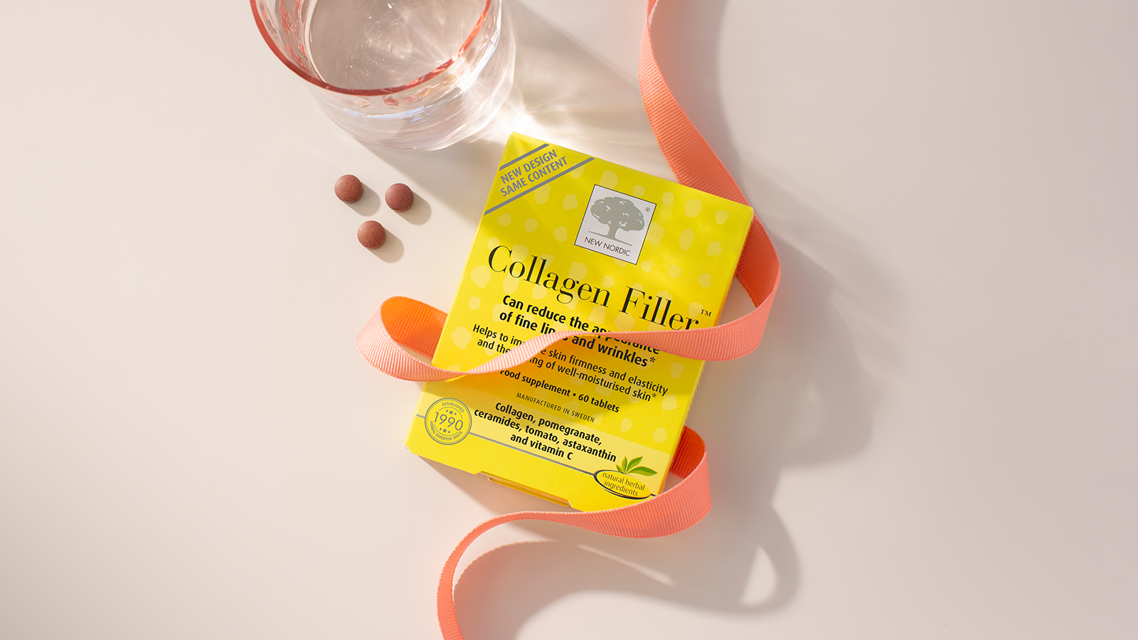 10 years of Skin Care™ Collagen Filler! 12 Collagen Filler™ displayed with a glass of water, tablets, and ribbon.