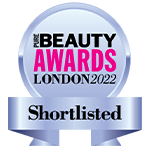 Badge, der viser en nominering til Pure Beauty Awards London 2022.
