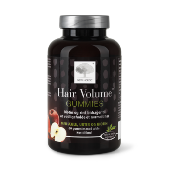 New Nordic Hair Volume™ Gummies med æble, urter og biotin. Biotin og zink bidrager til at vedligeholde normalt hår.