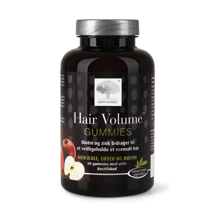 Home 19 New Nordic Hair Volume™ Gummies med æble, urter og biotin. Biotin og zink bidrager til at vedligeholde normalt hår.