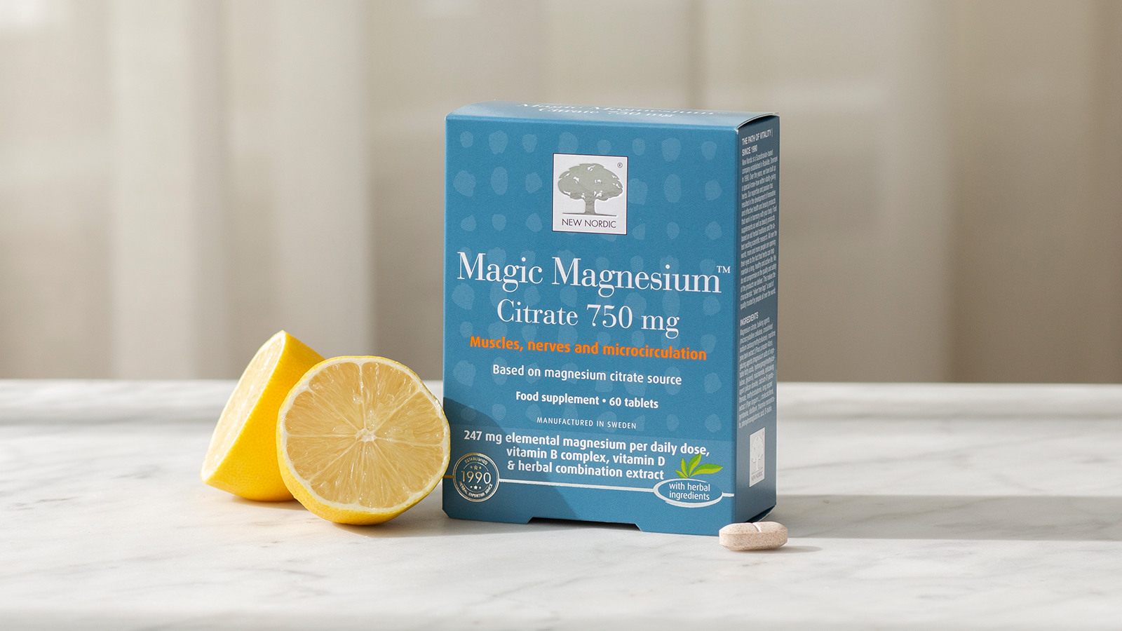 Discover NEW Magic Magnesium™ Citrate by New Nordic 9 Magic Magnesium™ Citrate package with lemons and a tablet on a light background.