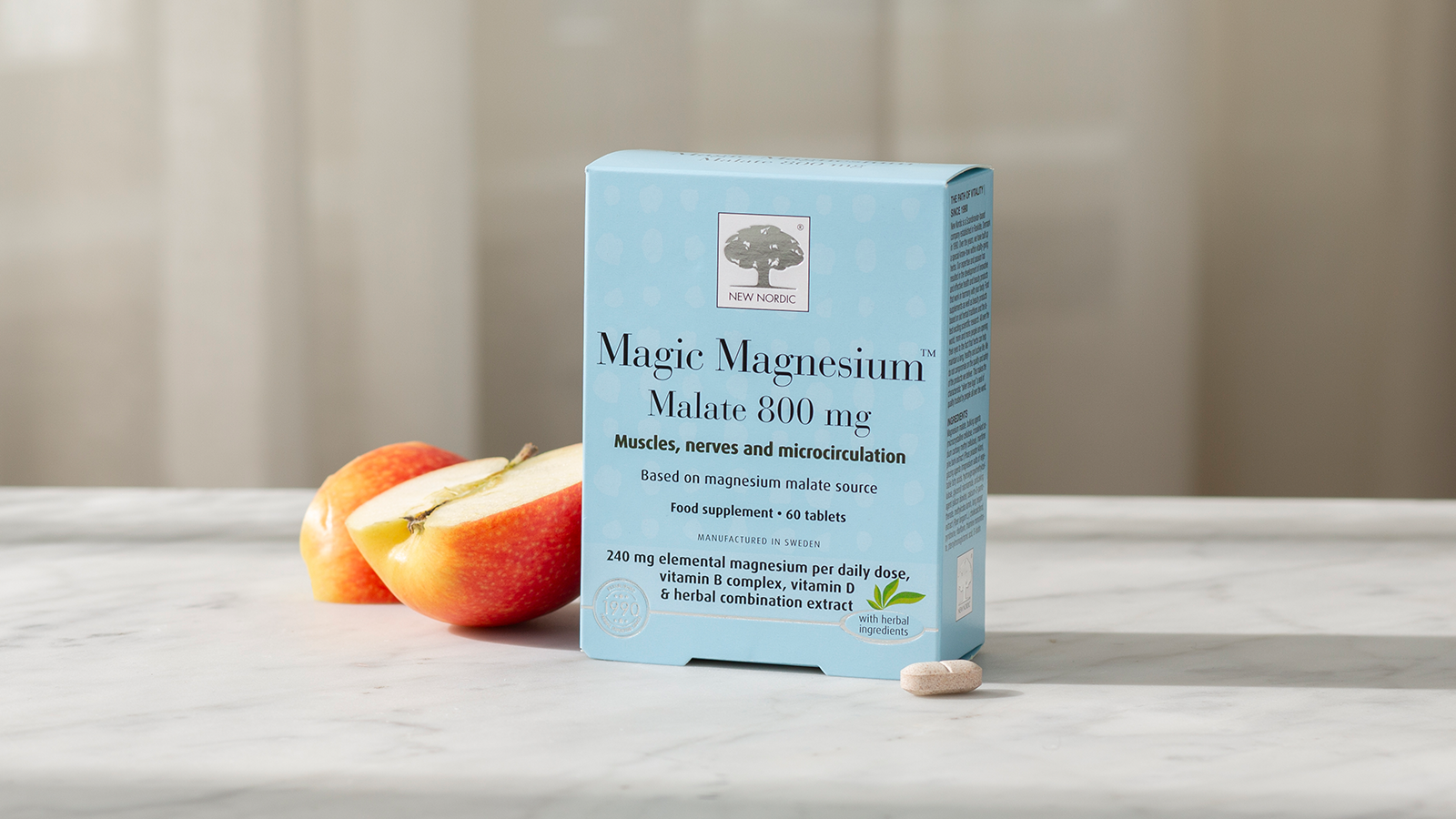 Magnesium Malate – How it Benefits Your Muscles 7 Magic Magnesium™ Malate with apples and a tablet on a light background.