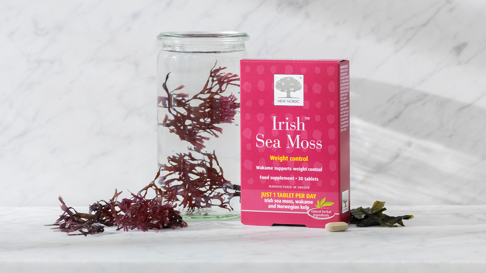 Irish Sea Moss: The Nutrient-Rich Superfood Taking the World by Storm 7 a box of Irish Sea Moss tablets next to a jar with water and irish sea moss in.