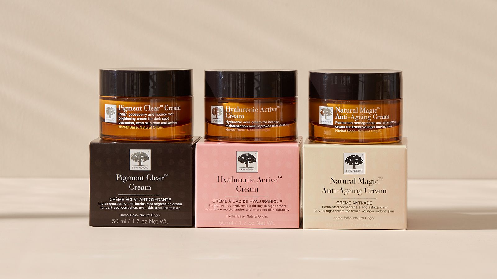 3 different kind of skin care cream products. Both boxes and glasses.